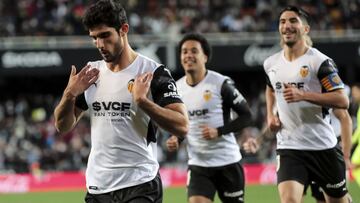 Gonzalo Guedes of Valencia CF celebrate after scoring the 1-0 goal with his teammate during Spanish La Liga match between Valencia CF and Elche CF at Mestalla stadium. In Valencia on December 11, 2021.