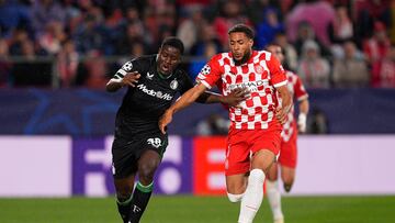 GIRONA, SPAIN - OCTOBER 02: Ibrahim Osman of Feyenoord controls the ball whilst under pressure from Arnaut Danjuma of Girona FC during the UEFA Champions League 2024/25 League Phase MD2 match between Girona FC and Feyenoord at Montilivi Stadium on October 02, 2024 in Girona, Spain. (Photo by Pedro Salado/Getty Images)