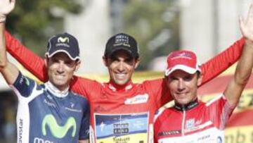 <b>GRAN VUELTA.</b> Alejandro Valverde (segundo), Alberto Contador (primero) y Purito Rodríguez (tercero), en el podio final de Madrid, en Cibeles.