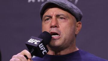 (FILES) In this file photo taken on December 10, 2021, Joe Rogan introduces fighters during the UFC 269 ceremonial weigh-in at MGM Grand Garden Arena in Las Vegas, Nevada. - Rogan, who has been called out by music legends Neil Young and Joni Mitchell for
