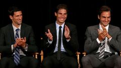 Novak Djokovic, Rafa Nadal y Roger Federer aplauden durante un acto del ATP Heritage Celebration en el Waldorf Astoria de Nueva York en 2013.