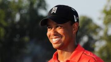 Tiger, con el trofeo.