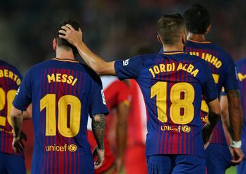 Messi and Alba celebrate Barça's opening goal.