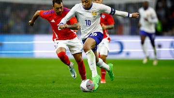 Soccer Football - International Friendly - France v Chile - Stade Velodrome, Marseille, France - March 26, 2024 France's Kylian Mbappe in action with Chile's Gabriel Suazo REUTERS/Sarah Meyssonnier