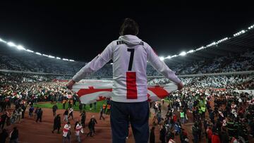 Georgia fans invade the pitch after their team won the UEFA EURO 2024 qualifying play-off final football match between Georgia and Greece in Tbilisi on March 26, 2024. (Photo by Giorgi ARJEVANIDZE / AFP)