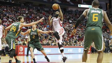 Nov 19, 2016; Houston, TX, USA; Houston Rockets guard James Harden (13) drives to the basket against Utah Jazz center Jeff Withey (24) and forward Joe Ingles (2) in the second half at Toyota Center. Rockets won 111-102. Mandatory Credit: Thomas B. Shea-USA TODAY Sports