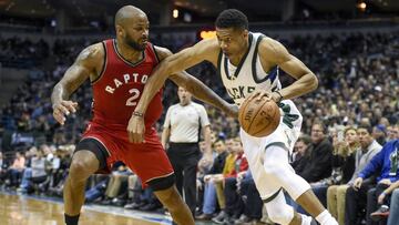 Mar 4, 2017; Milwaukee, WI, USA; Milwaukee Bucks forward Giannis Antetokounmpo (34) drives for the basket against Toronto Raptors forward P.J. Tucker (2) in the fourth quarter at BMO Harris Bradley Center. The Bucks beat the Raptors 101-94. Mandatory Credit: Benny Sieu-USA TODAY Sports
