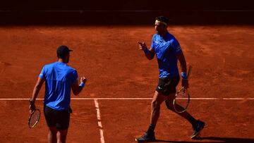 MADRID, SPAIN - MAY 08: Robert Farah of Colombia and Juan Sebastian Cabal of Colombia celebrate a point in the men's doubles final at La Caja Magica on May 08, 2022 in Madrid, Spain. (Photo by Denis Doyle/Getty Images)