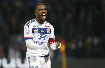 Alexandre Lacazette celebrates victory for Olympique Lyonnais over AS Saint-Etienne.