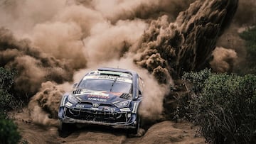 Toyota Gazoo Racing WRT's British driver Elfyn Evans steers his Toyota GR Yaris Rally1 with British co-driver Scott Martin during the World Rally Championship (WRC) Safari Rally Kenya Special Stage 7 (SS7) in Gilgil on March 21, 2025. (Photo by Luis TATO / AFP)