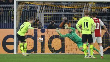 DORTMUND, GERMANY - NOVEMBER 03: Marco Reus of Borussia Dortmund scores their team's first goal from a penalty during the UEFA Champions League group C match between Borussia Dortmund and AFC Ajax at Signal Iduna Park on November 03, 2021 in Dortmund