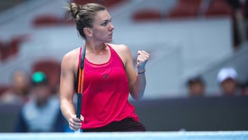 BEIJING, CHINA - OCTOBER 06:  Simona Halep of Romania celebrates a point  during the Women&#039;s singles Quarterfinals match against Daria Kasatkina of Russia on day seven of 2017 China Open at the China National Tennis Centre on October 6, 2017 in Beiji