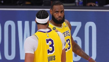 LAKE BUENA VISTA, FLORIDA - SEPTEMBER 24: LeBron James #23 of the Los Angeles Lakers and Anthony Davis #3 of the Los Angeles Lakers react after their win against the Denver Nuggets in Game Four of the Western Conference Finals during the 2020 NBA Playoffs at AdventHealth Arena at the ESPN Wide World Of Sports Complex on September 24, 2020 in Lake Buena Vista, Florida. NOTE TO USER: User expressly acknowledges and agrees that, by downloading and or using this photograph, User is consenting to the terms and conditions of the Getty Images License Agreement.   Mike Ehrmann/Getty Images/AFP
 == FOR NEWSPAPERS, INTERNET, TELCOS &amp; TELEVISION USE ONLY ==