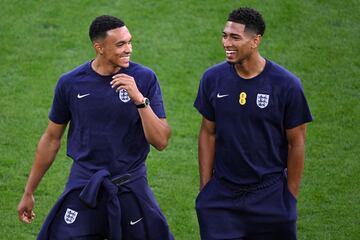 England's defender #08 Trent Alexander-Arnold (L) and England's midfielder #10 Jude Bellingham walk on the pitch before the start of the UEFA Euro 2024 semi-final football match between the Netherlands and England at the BVB Stadion in Dortmund on July 10, 2024. (Photo by Kirill KUDRYAVTSEV / AFP)