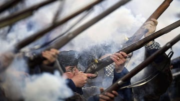 FOXBOROUGH, MA - DECEMBER 02: The end zone militia fire their muskets prior to the game between the Minnesota Vikings and the New England Patriots at Gillette Stadium on December 2, 2018 in Foxborough, Massachusetts. Billie Weiss/Getty Images/AFP
== FOR NEWSPAPERS, INTERNET, TELCOS & TELEVISION USE ONLY ==