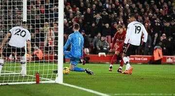 Roberto Firmino scores Liverpool's seventh against United. 