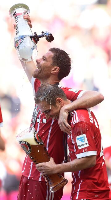 Philipp Lahm y Xabi Alonso.