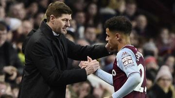 Soccer Football - Premier League - Aston Villa v Leeds United - Villa Park, Birmingham, Britain - February 9, 2022 Aston Villa&#039;s Philippe Coutinho shakes hands with manager Steven Gerrard as he walks off to be substituted REUTERS/Rebecca Naden EDITOR