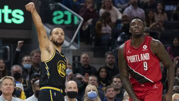 Stephen Curry lanza un triple ante Nassir Little, jugador de Portland Trail Blazers.