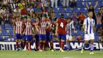 Los jugadores del Atl&eacute;tico celebran la victoria ante la Real.