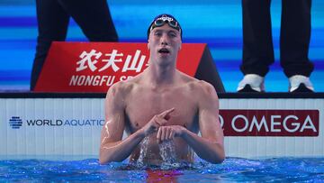 Swimming - World Aquatics Championships - Aspire Dome, Doha, Qatar - February 18, 2024 Ireland's Daniel Wiffen celebrates after winning the men's 1500m freestyle final REUTERS/Evgenia Novozhenina