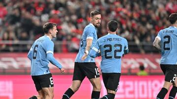 Uruguay's Sebastian Coates Nion (C) celebrates his goal against South Korea during a friendly football match between South Korea and Uruguay in Seoul on March 28, 2023. (Photo by JUNG YEON-JE / AFP) (Photo by JUNG YEON-JE/AFP via Getty Images)