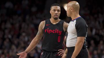 Mar 12, 2018; Portland, OR, USA; Portland Trail Blazers guard Damian Lillard (0) talks to an official during the second half against the Miami Heat at the Moda Center. The Trail Blazers won 115-99. Mandatory Credit: Troy Wayrynen-USA TODAY Sports
