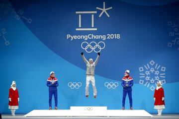 Gold medalist Andreas Wellinger jumps for joy