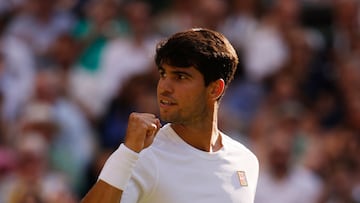Tennis - Wimbledon - All England Lawn Tennis and Croquet Club, London, Britain - July 13, 2025 Spain's Carlos Alcaraz reacts during the men's singles final against Italy's Jannik Sinner REUTERS/Andrew Couldridge