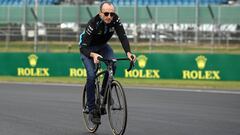 NORTHAMPTON, ENGLAND - JULY 11: Robert Kubica of Poland and Williams cycles on the track during previews ahead of the F1 Grand Prix of Great Britain at Silverstone on July 11, 2019 in Northampton, England. (Photo by Bryn Lennon/Getty Images)