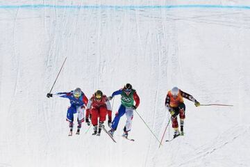 Russia's Sergey Ridzik competes to win the men's ski cross quarter final event ahead of Canada's David Duncan (R), France's Francois Place and France's Jean Frederic Chapuis during the Pyeongchang 2018 Winter Olympic Games at the Phoenix Park in Pyeongcha