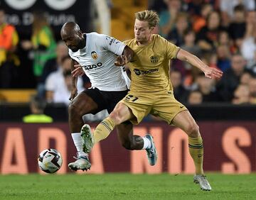 Dimitri Foulquier y Frenkie de Jong.