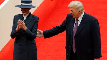 U.S. President Donald Trump and first lady Melania Trump arrive at Capital One arena on the inauguration day of Trump's second presidential term, in Washington, U.S., January 20, 2025. REUTERS/Brian Snyder