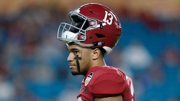 (FILES) In this file photo taken on December 29, 2018, Tua Tagovailoa #13 of the Alabama Crimson Tide looks on prior to the game against the Oklahoma Sooners during the College Football Playoff Semifinal at the Capital One Orange Bowl at Hard Rock Stadium