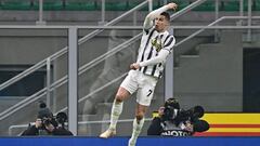 Juventus&#039; Portuguese forward Cristiano Ronaldo celebrates after scoring a penalty to equalize during the Italian Cup quarter final first leg football match beetween Inter Milan and Juventus Turin on February 2, 2021 at the San Siro stadium in Milan. 