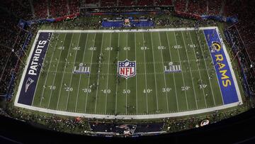 Players warm up before the NFL Super Bowl 53 football game between the Los Angeles Rams and the New England Patriots, Sunday, Feb. 3, 2019, in Atlanta. (AP Photo/Morry Gash)