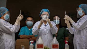 MANILA, PHILIPPINES - FEBRUARY 15: Health workers prepare to administer mock COVID-19 vaccines as they take part in a mock vaccination drill at the Philippine General Hospital on February 15, 2021 in Manila, Philippines. Pressure is mounting on the Philip