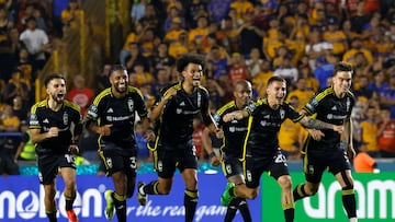 Soccer Football - CONCACAF Champions Cup - Quarter-Final - Second Leg - Tigres UANL v Columbus Crew - Estadio Universitario, Monterrey, Mexico - April 9, 2024 Columbus Crew players celebrate after winning the penalty shootout REUTERS/Daniel Becerril