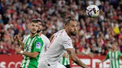 Real Betis' Argentinian midfielder Guido Rodriguez (L) vies with Sevilla's Serbian midfielder Nemanja Gudelj during the SPanish league football match between Sevilla FC and Real Betis at the Ramon Sanchez Pizjuan stadium in Seville on May 21, 2023. (Photo by CRISTINA QUICLER / AFP)