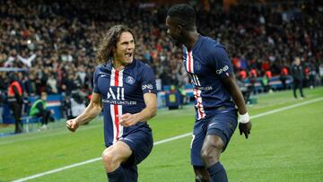 Paris Saint-Germain's Uruguayan forward Edinson Cavani (L) and Paris Saint-Germain's Senegalese midfielder Idrissa Gueye celebrate after a goal during the French L1 football match between Paris Saint-Germain (PSG) and Lyon (OL) at the Parc des P