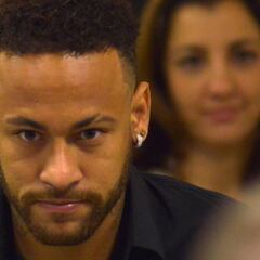 Neymar arrives at police station in a wheelchair