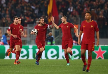 Gerard Pique takes Edin Dzeko down inside the box and De Rossi makes good the penalty. (2-0)