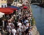 Newcastle United fan dives into Milan canal for unlikely race