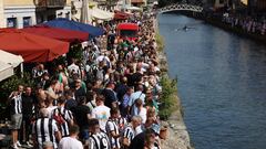 Newcastle United fan dives into Milan canal for unlikely race
