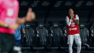 Santos forward #10 Neymar reacts from the bench during Campeonato Paulista A1 semi-final football match between Corinthians and Santos at Arena Corinthians in Sao Paulo on March 9, 2025. (Photo by Miguel SCHINCARIOL / AFP)