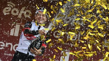Slovenia's Tadej Pogacar celebrates winning the Strade Bianche (White Roads) cycling race, in Siena, Italy, Saturday, March 5, 2022. (Gian Mattia D'Alberto/LaPresse via AP)