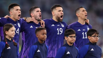 DOHA, QATAR - NOVEMBER 30:  Argentina players line up for the national anthem prior to the FIFA World Cup Qatar 2022 Group C match between Poland and Argentina at Stadium 974 on November 30, 2022 in Doha, Qatar. (Photo by Julian Finney/Getty Images)