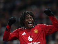 Manchester United's Danish defender #13 Patrick Dorgu celebrates after scoring the opening goal of the English Premier League football match between Manchester United and Newcastle United at Old Trafford in Manchester, north west England, on December 26, 2025. (Photo by Darren Staples / AFP) / RESTRICTED TO EDITORIAL USE. No use with unauthorized audio, video, data, fixture lists, club/league logos or 'live' services. Online in-match use limited to 120 images. An additional 40 images may be used in extra time. No video emulation. Social media in-match use limited to 120 images. An additional 40 images may be used in extra time. No use in betting publications, games or single club/league/player publications. /