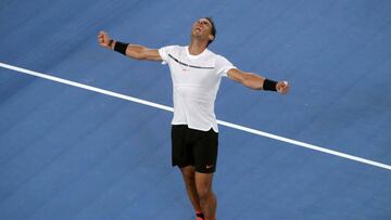 Spain's Rafael Nadal celebrates beating France's Gael Monfils in their men's singles fourth round match on day eight of the Australian Open