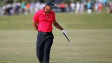 Tiger sigue con espasmos y es duda para el Masters de Augusta